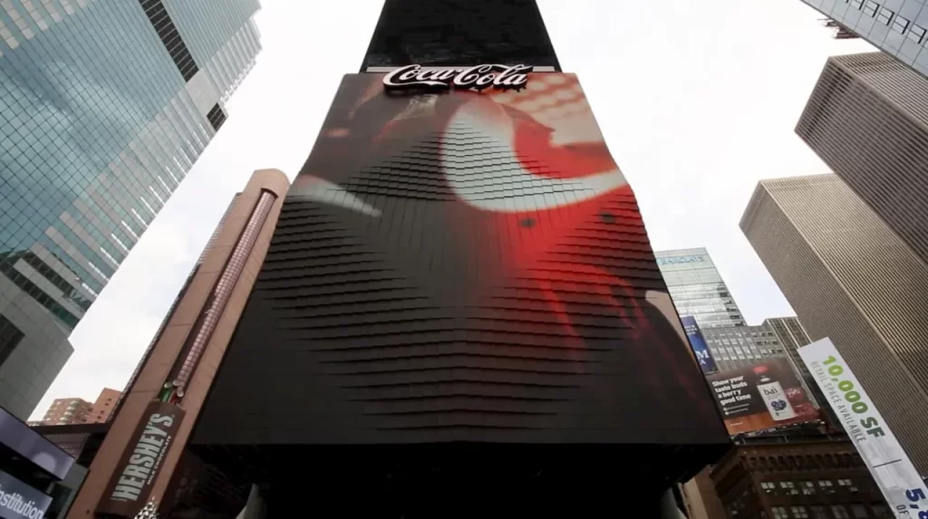 Contoh SIgnage - 3D Robotic Billboard Coca Cola di New York